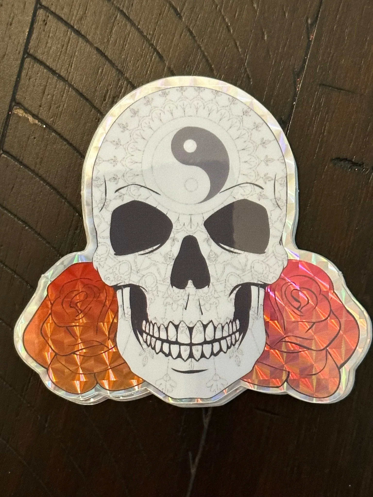 Skull and Roses Mandala sticker -Prismatic paper that’s weather proof - Changing pattern when viewed at different angles - Brightly colored