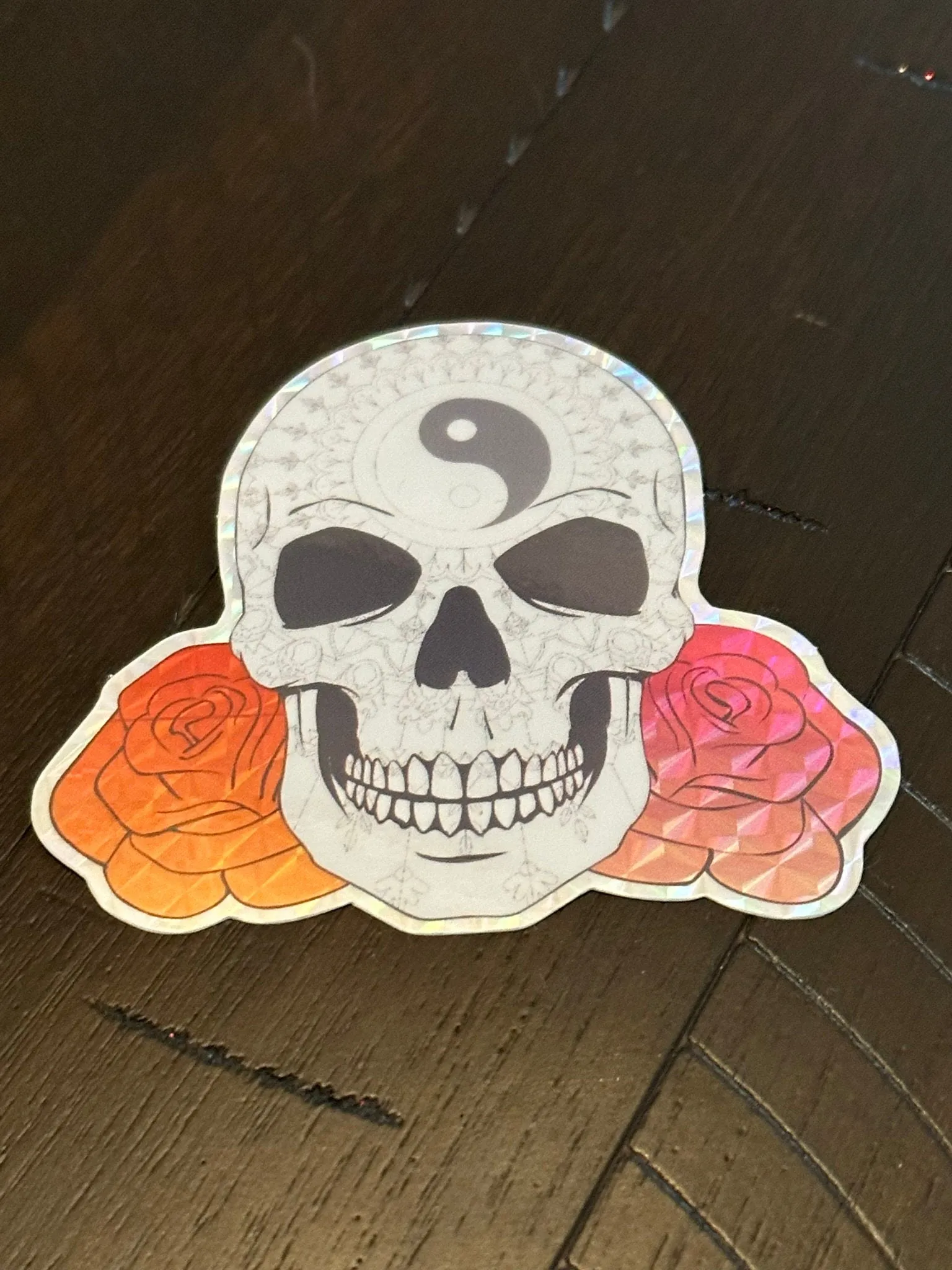 Skull and Roses Mandala sticker -Prismatic paper that’s weather proof - Changing pattern when viewed at different angles - Brightly colored