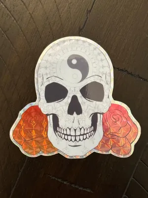 Skull and Roses Mandala sticker -Prismatic paper that’s weather proof - Changing pattern when viewed at different angles - Brightly colored